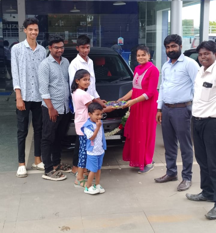 Happy family receives new car with fast car loan approval from Car Loan Madurai – Sakthi Associates